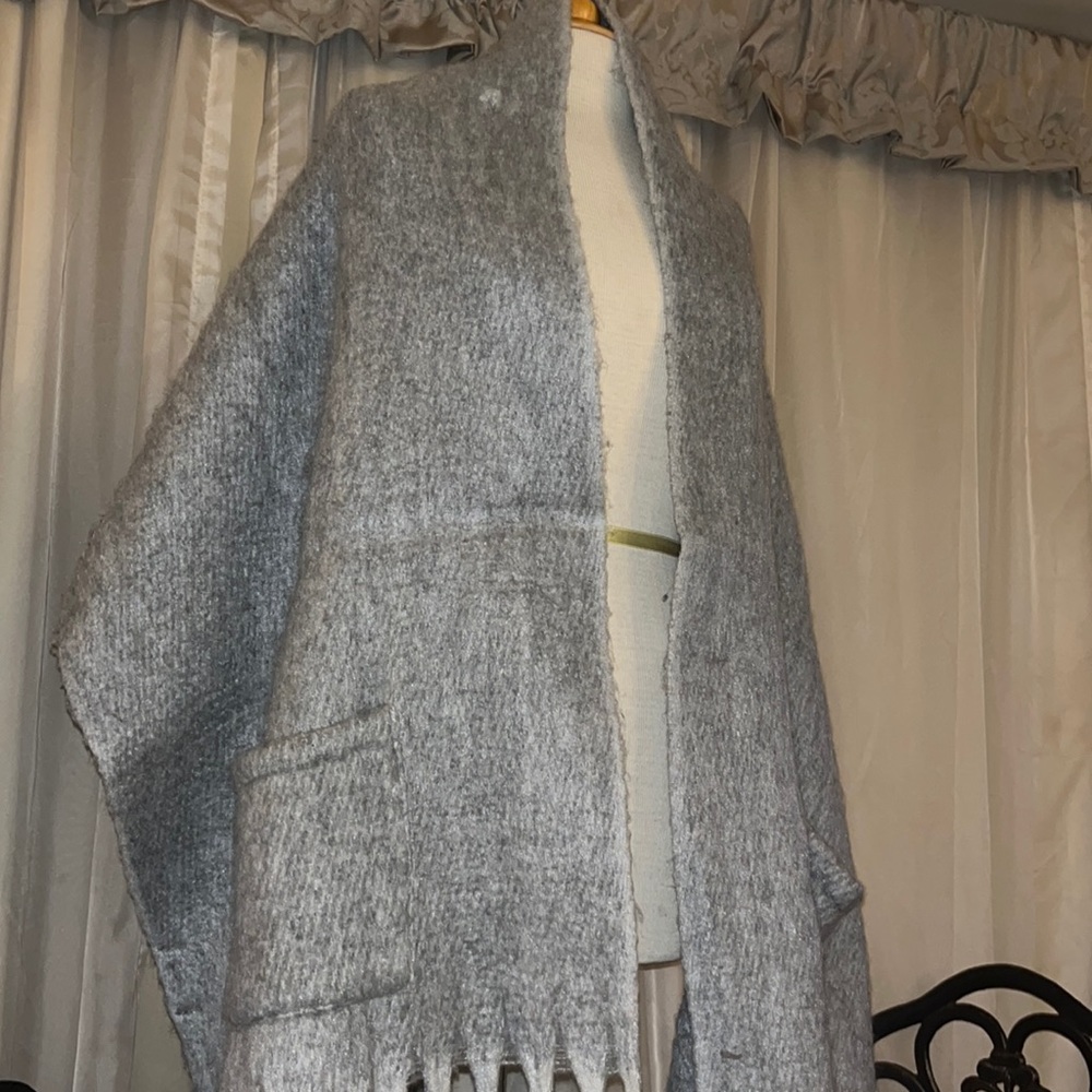 Pocketed fringe shawl